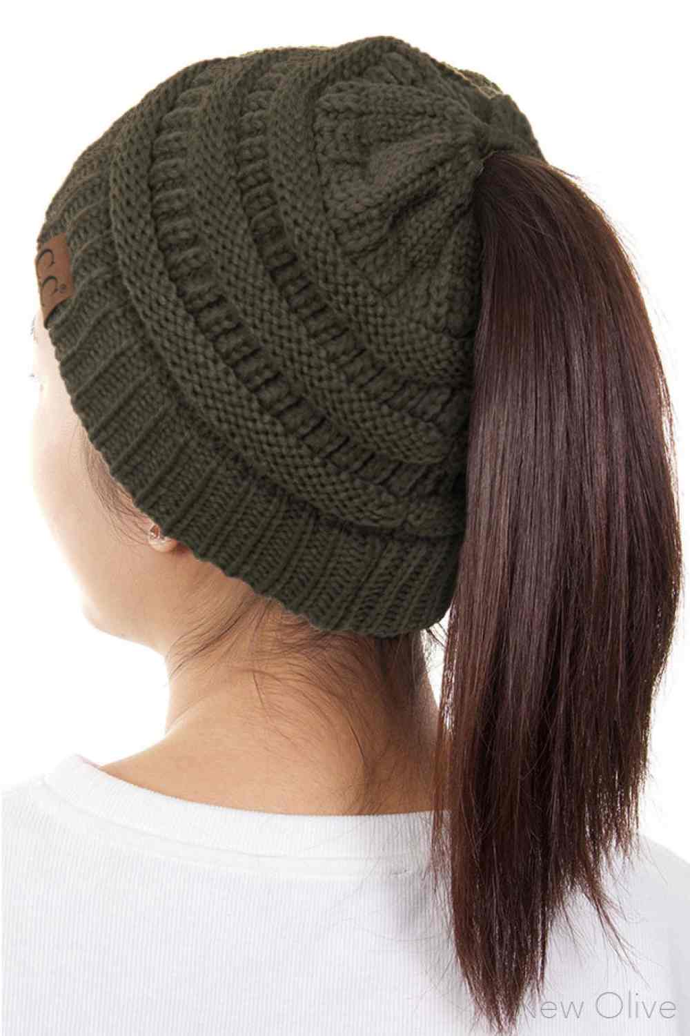 New Olive The C.C Solid Color Ponytail Messy Bun Beanie combines comfort with versatility for effortless everyday style. Crafted from 100% soft acrylic, this beanie features an open crown design that accommodates ponytails and messy buns while keeping you warm. The one-size-fits-most construction ensures a secure, flattering fit for virtually anyone. Perfect for casual outings, workouts, or relaxed weekends, this practical accessory transitions seamlessly from season to season.