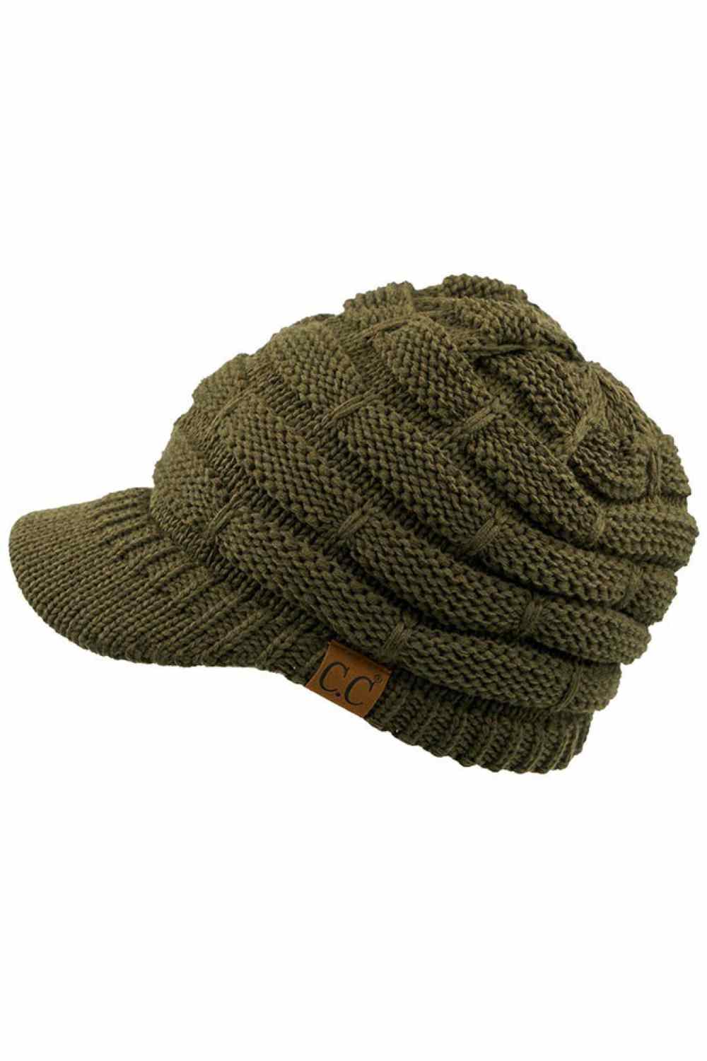 New Olive The C.C Ribbed Knit Brim Beanie combines comfort and style in one versatile piece. Made from 100% acrylic, this lightweight beanie features a classic ribbed knit construction with a structured brim for added warmth and coverage. Perfect for casual outings or outdoor activities, it pairs effortlessly with any winter wardrobe.
