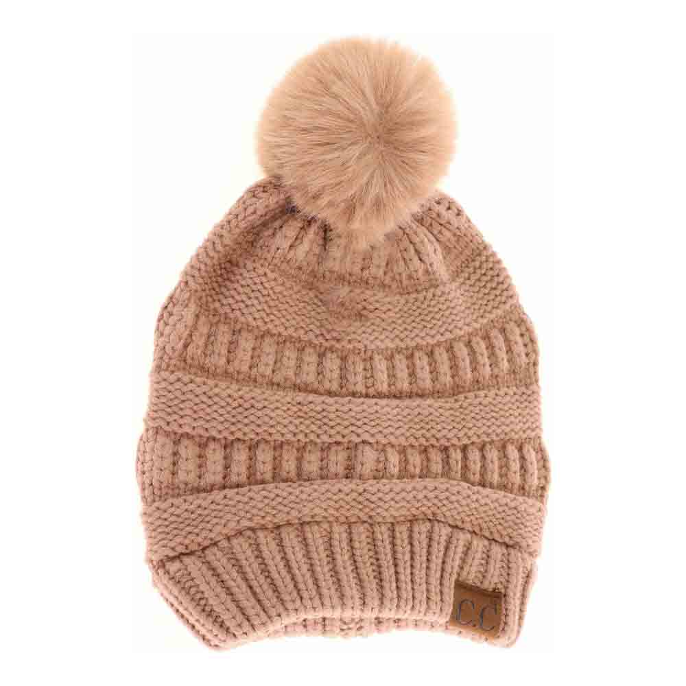 Nude Super Soft Matching Fur Pom C.C Beanie combines luxurious softness with practical warmth. Made from premium materials, this beanie ensures a snug fit that keeps you comfortable in chilly conditions. Featuring a coordinating fur pom, it offers a stylish accent that complements any winter outfit. Ideal for those seeking both function and fashion, this beanie delivers lasting comfort without compromising on elegance. 