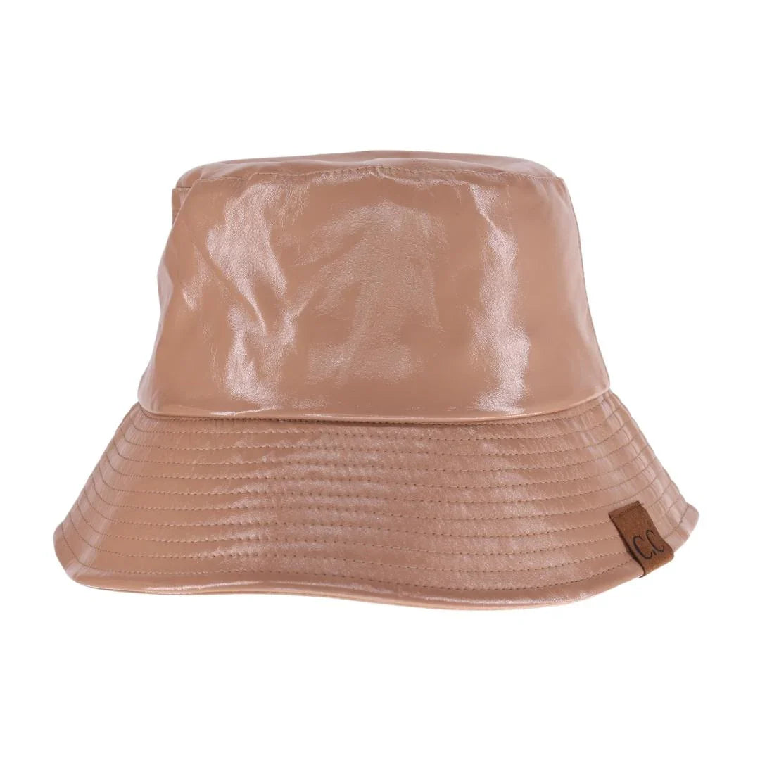 Nude C.C Vegan Leather Bucket Hat offers a stylish and cruelty-free option for sun protection. Made from premium vegan leather, this hat provides both fashion and functionality. Keep your head cool and protected while making an ethical choice.