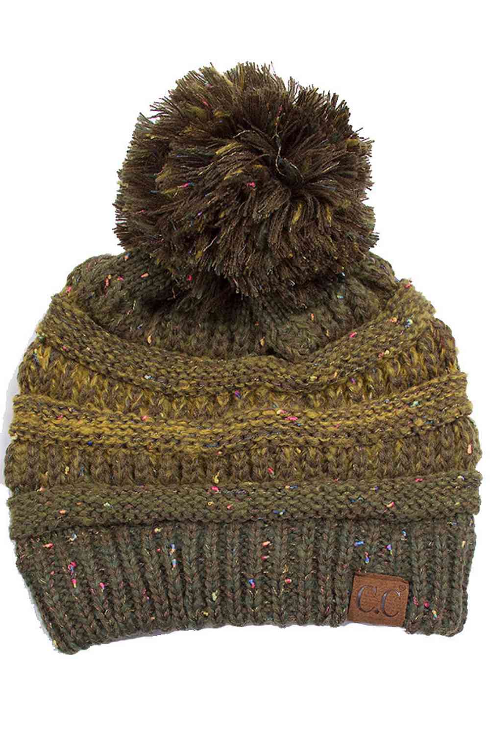 Olive Wrap yourself in cozy style with the C.C Ombre Beanie with Pom Pom. Made from 100% soft acrylic, this lightweight knit delivers warmth without the weight, making it ideal for layering or standalone wear.