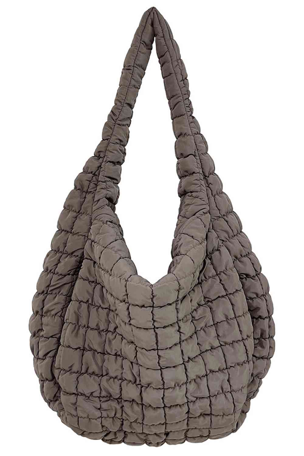 olive Spacious quilted bag designed for everyday carry and travel. Features a durable 100% polyester construction with a quilted exterior for added protection and style. Generous dimensions of 17.7" x 19.7" x 8.7" provide ample room for essentials, making it perfect for shopping, work, or weekend getaways. Lightweight and easy to maintain. Made in China.