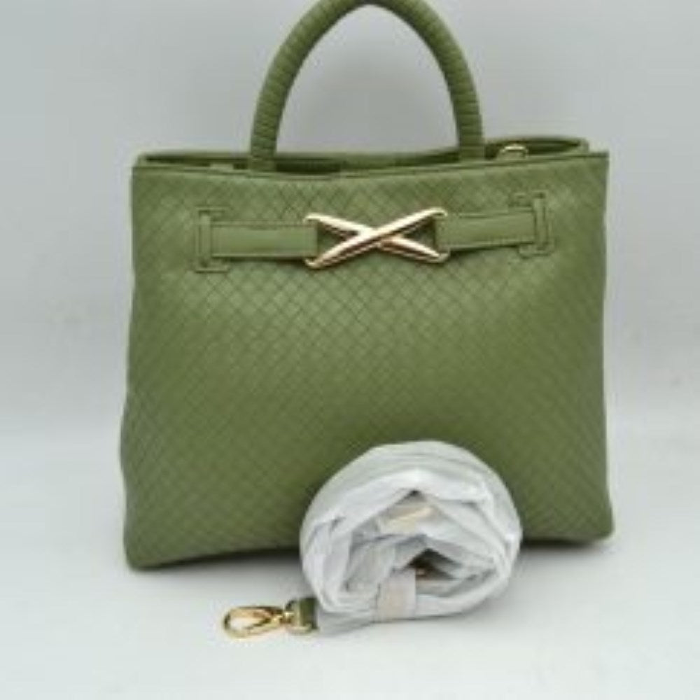 Olive This structured satchel features an intricately textured, woven pattern across the exterior, making it a sophisticated choice for elevated everyday use. The front panel is accented by a decorative horizontal band joined together with a prominent, metallic X-shaped hardware detail. Built with a sturdy, rounded top handle for a classic handheld carry, the bag also includes a main storage compartment and a detachable long shoulder strap secured by metallic clasps