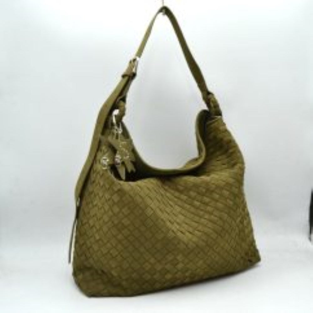 Olive This slouchy hobo bag features a distinctive woven pattern across its exterior, offering a textured and modern look for everyday use. Designed with a spacious main compartment to easily accommodate daily essentials, the bag includes an adjustable flat shoulder strap secured with a metallic buckle for customizable carrying comfort. A decorative star-shaped charm is attached to the side via metallic hardware, adding a unique accent to the overall clean design.