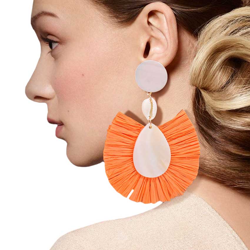 Orange Puka Shell Mother of Pearl Teardrop Raffia Trimmed Earrings, adorn yourself with these teardrop raffia trimmed earrings! puka shell mother-of-pearl teardrop earrings go perfectly with a t-shirt, summer dress or work clothes, beach party, and many more. 