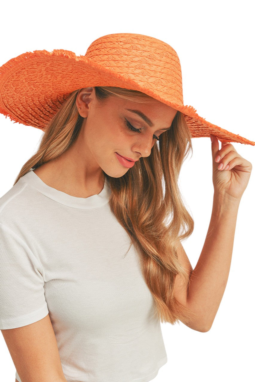 Orange Solid Floppy Sun Hat provides superior UV protection while maintaining a timeless silhouette. Constructed with durable materials that retain shape throughout wear, it features an adjustable interior band for a secure fit across head sizes. The lightweight design ensures comfort during extended outdoor activities, making it an essential accessory for both sun protection and refined style.