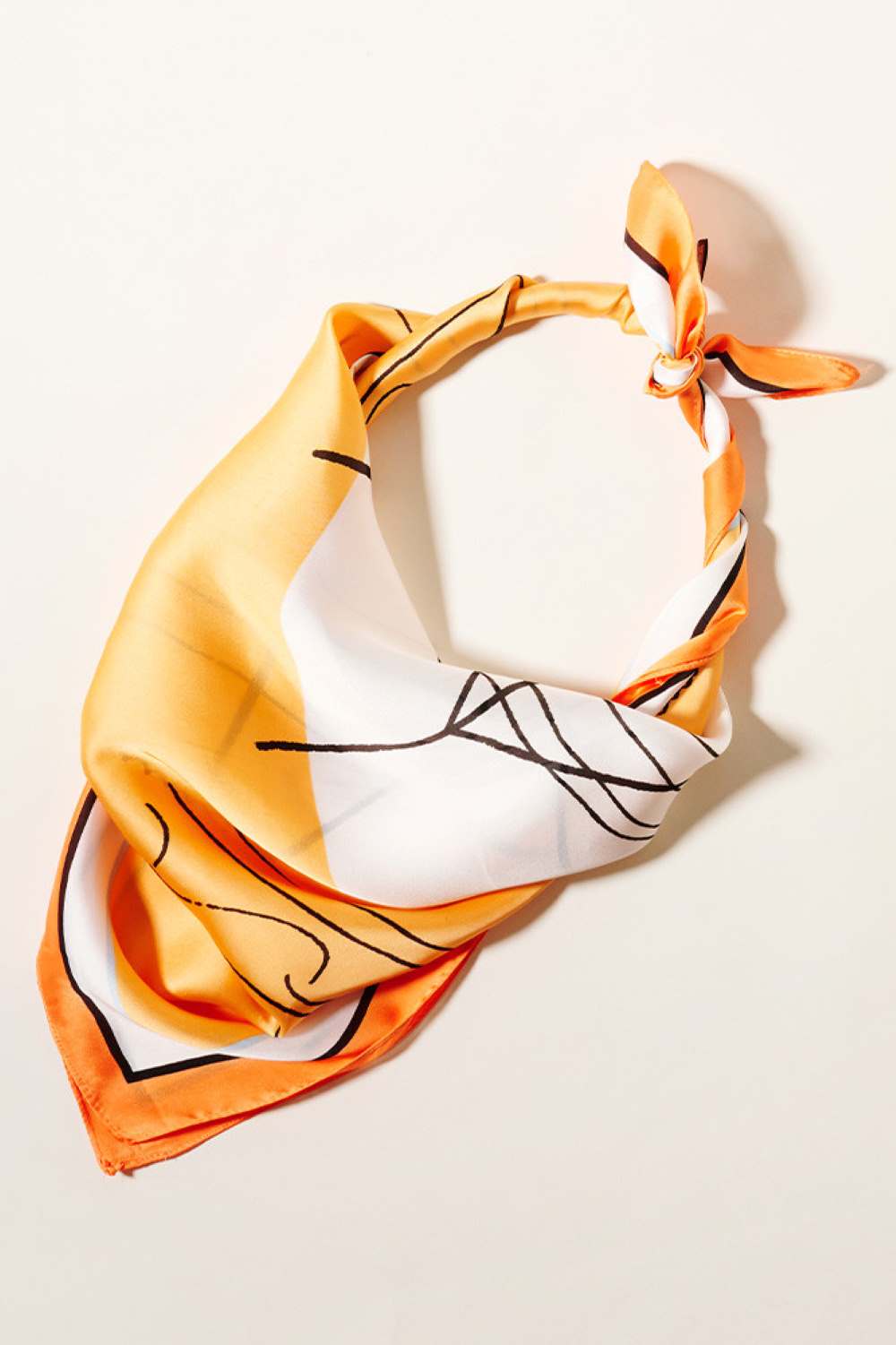 Orange Elevate your accessory game with this stunning Geometric Print Square Silky Scarf. Crafted from 100% polyester, this luxuriously soft scarf features a modern geometric pattern that complements any outfit. The perfect 27.5" x 27.5" size offers versatility wear it as a neck scarf, headwrap, or tie it to your bag for an instant style boost. Lightweight and easy to care for, this scarf transitions seamlessly from casual to sophisticated looks. A must-have piece for anyone who loves bold patterns and silk