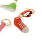 Orange Rhinestone Pave Sneaker Bag Charm features a sparkling rhinestone pave design that is sure to add a touch of glamour to any bag. The charm is perfect for sneaker lovers and fashionistas alike, making it a versatile and stylish accessory. With its high-quality construction, this charm is a must-have for any fashion-forward individual.