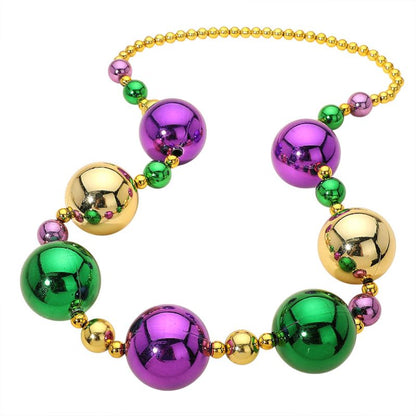 Multi, Purple Oversized statement beaded necklace featuring bold round accents arranged for dramatic impact and playful movement. Designed to stand out at parties, themed events, parades, and celebrations, this necklace elevates simple outfits with eye-catching style while remaining lightweight and easy to wear.