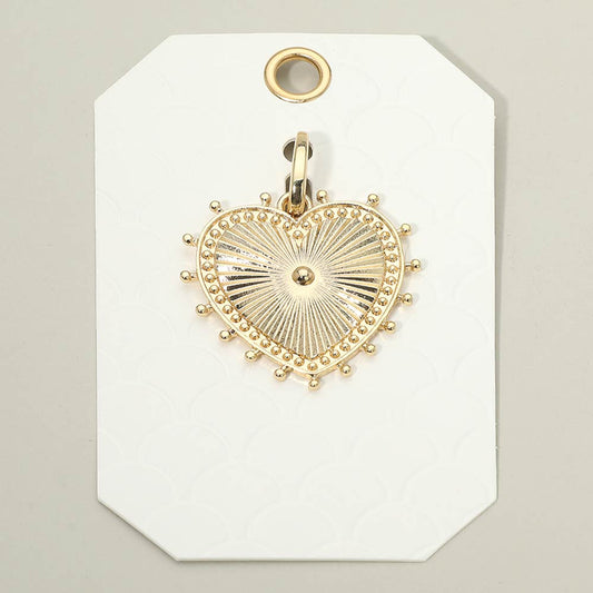 Madeline Love Gold Textured Metal Sunburst Heart Pendant - Bags & Wallets