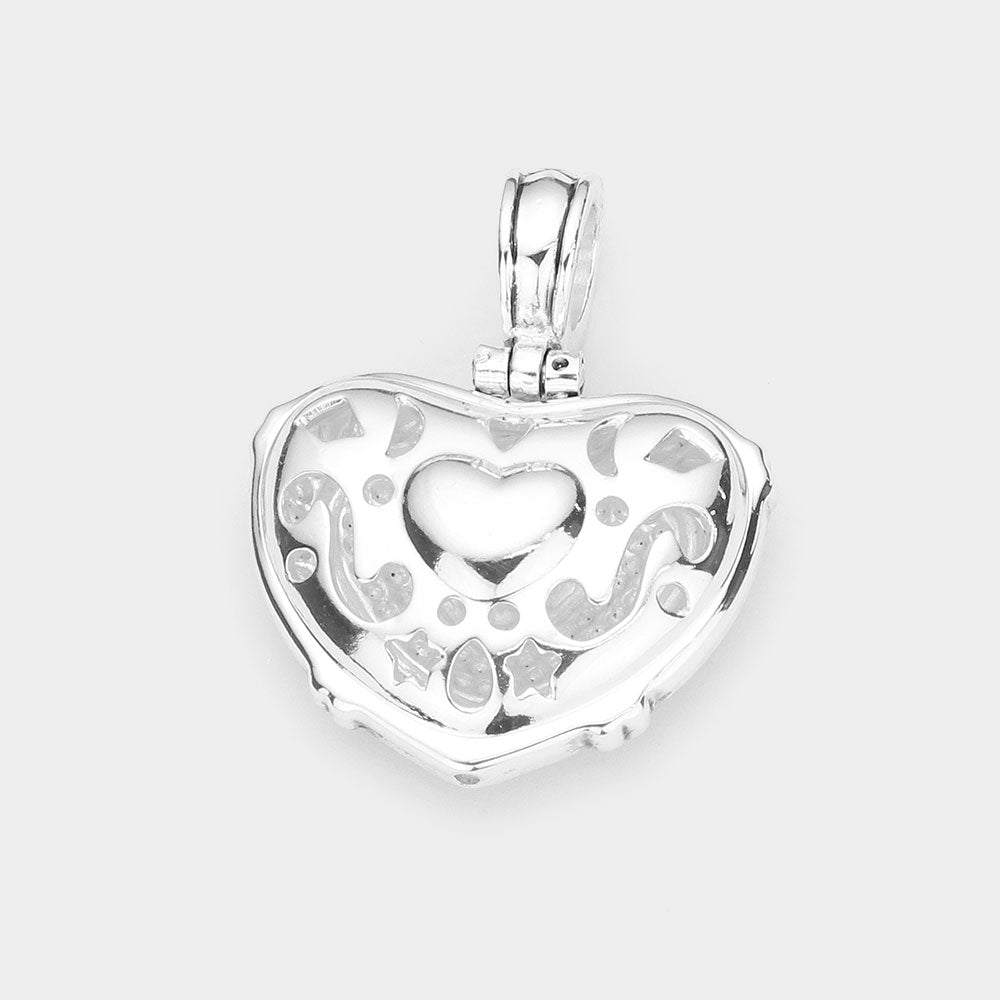 Silver Stone Embellished Metal Heart Pendant adds a touch of elegance to any outfit. With its stunning design and expertly crafted materials, this pendant is sure to become a staple in your jewelry collection. The stone embellishments add a touch of sparkle, making it perfect for any occasion.