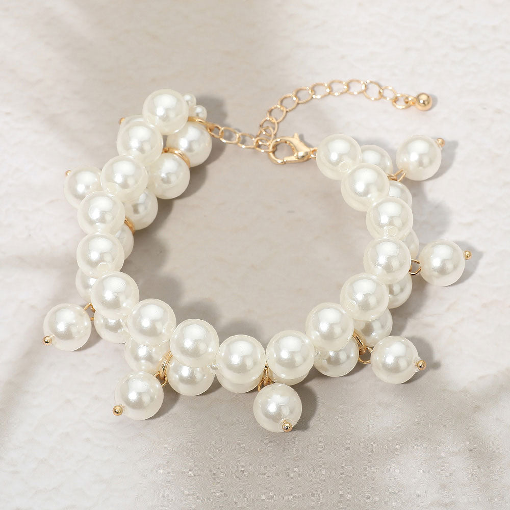 Madeline Love Cream, Gold Pearl Charm Double Strand Bracelet - Bracelets