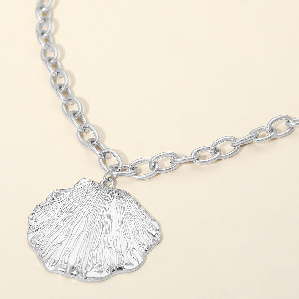 Madeline Love Worn Silver Textured Metal Seashell Pendant Necklace - Necklaces