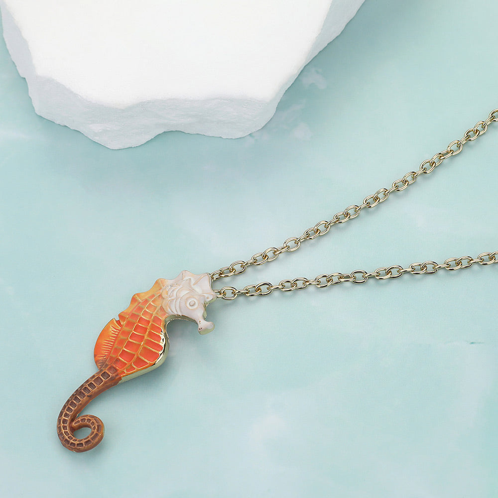 Madeline Love Coral, Gold Seahorse Colored Metal Pendant Necklace - Necklaces