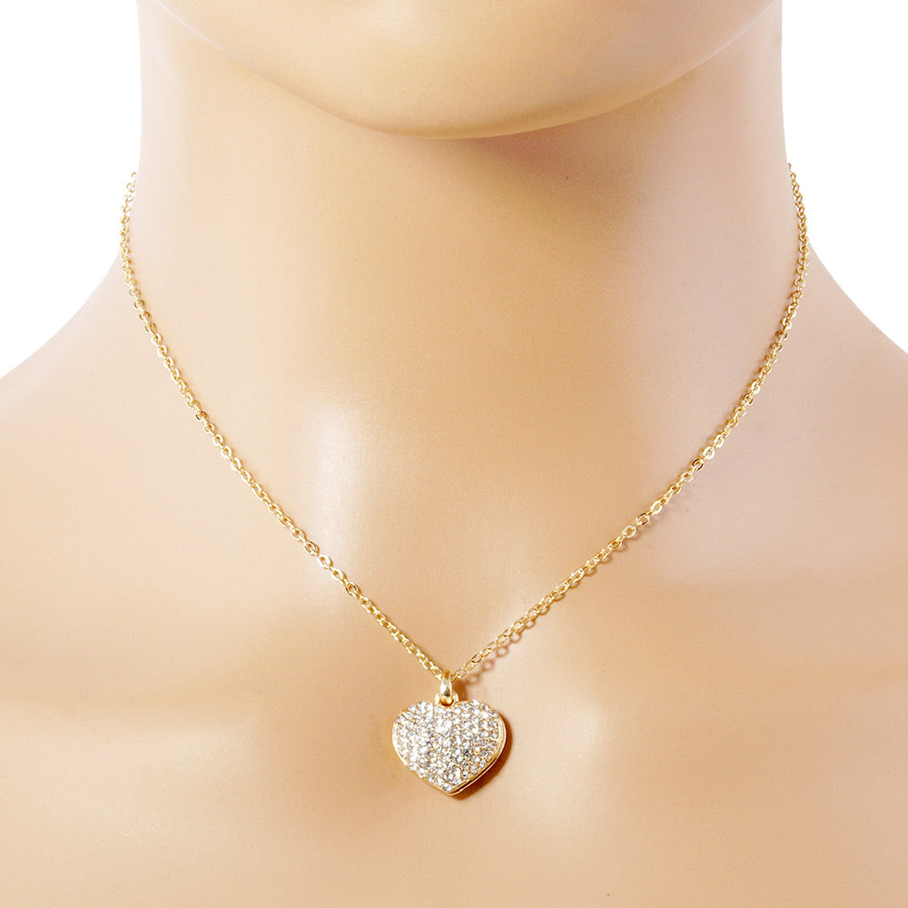 Gold Pave heart pendant necklace features a stunning design that is sure to capture attention. With its intricate pave detailing, this necklace adds a touch of elegance to any outfit. Crafted from high-quality materials, it offers both durability and style. Perfect for any occasion, this necklace is a must-have accessory for any fashion-forward individual.