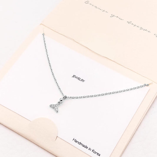 Madeline Love Silver CZ Embellished Whale Tail Pendant Necklace - Jewelry