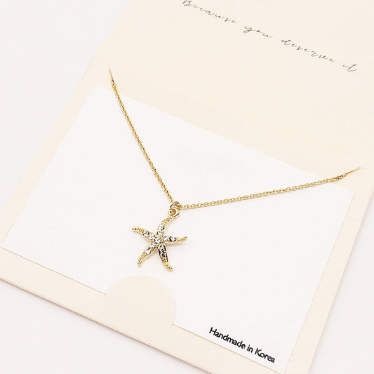 Madeline Love Gold Rhinestone Embellished Starfish Pendant Necklace - Necklaces