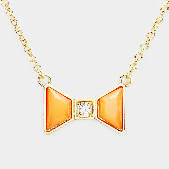 Madeline Love Gold, Peach Stone Bow Pendant Necklace - Necklaces