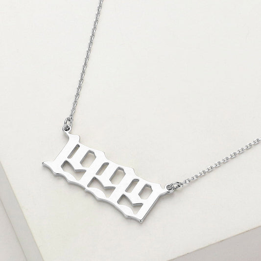 Madeline Love Rhodium White Gold Dipped 1999 Birth Year Plate Pendant Necklace - Necklaces