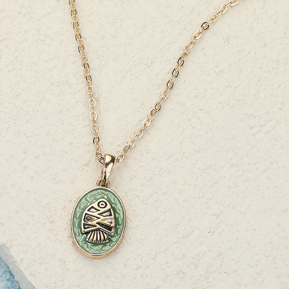 Madeline Love Antique Gold, Green Fish Colored Metal Pendant Necklace - Necklaces
