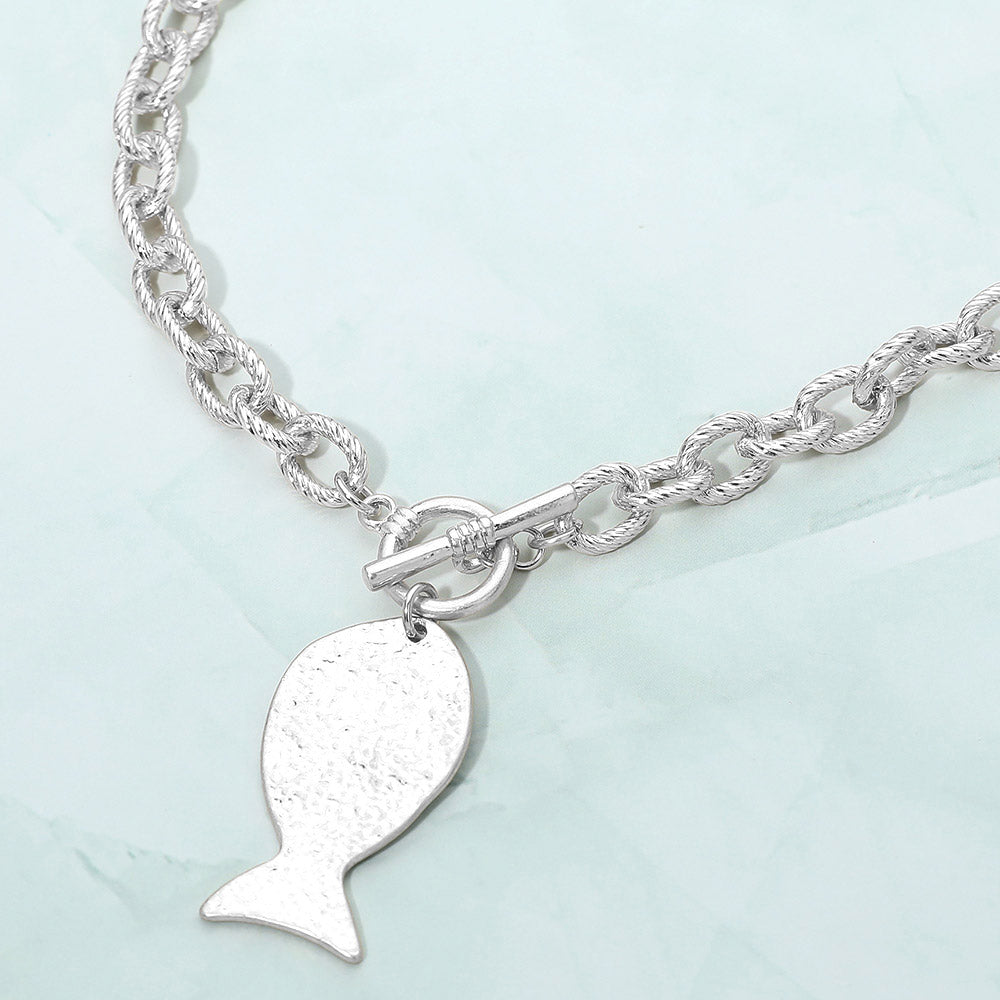 Madeline Love Worn Silver Brushed Metal Fish Charm Toggle Necklace - Necklaces