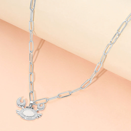 Madeline Love Mother of Pearl, Silver Stainless Steel Mother of Pearl CZ Stone Paved Crab Charm Pendant Paperclip Chain Necklace - Jewelry