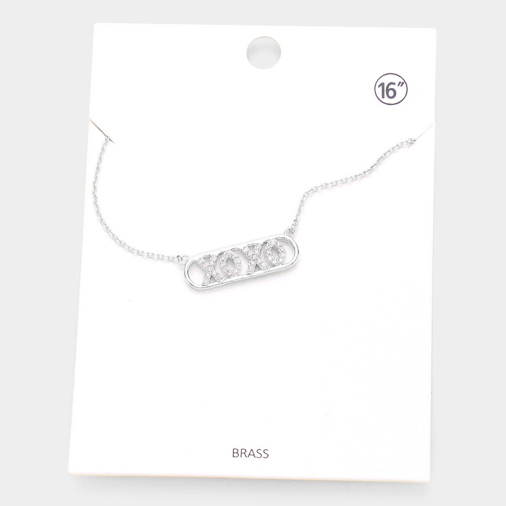 Madeline Love Rhodium XOXO Brass Metal Rhinestone Embellished Message Pendant Necklace - Necklaces