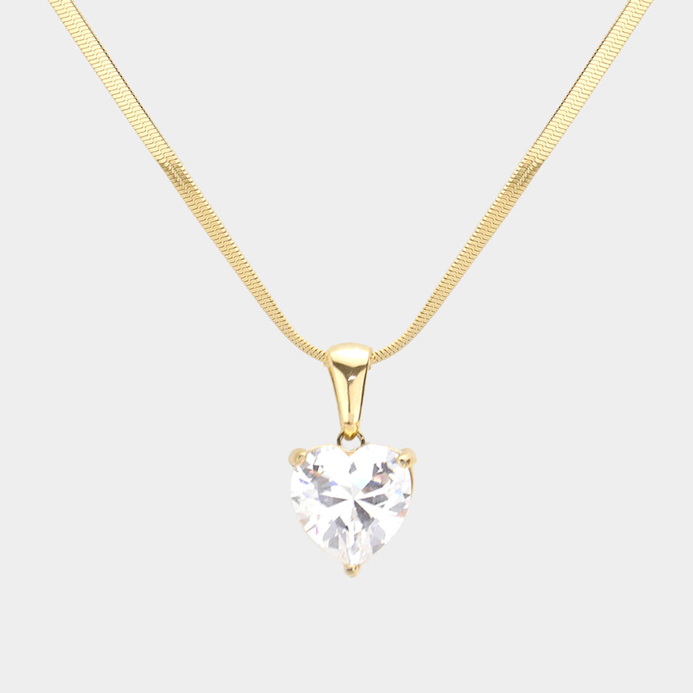 18K Gold Dipped Stainless Steel CZ Heart Pendant Necklace, a perfect way to add a luxurious touch to any outfit. Crafted from stainless steel in 18K gold plating, it features a sparkling cubic zirconia heart pendant. Durable and long-lasting, it's sure to make a statement. Perfect gift for Valentine's or any other day
