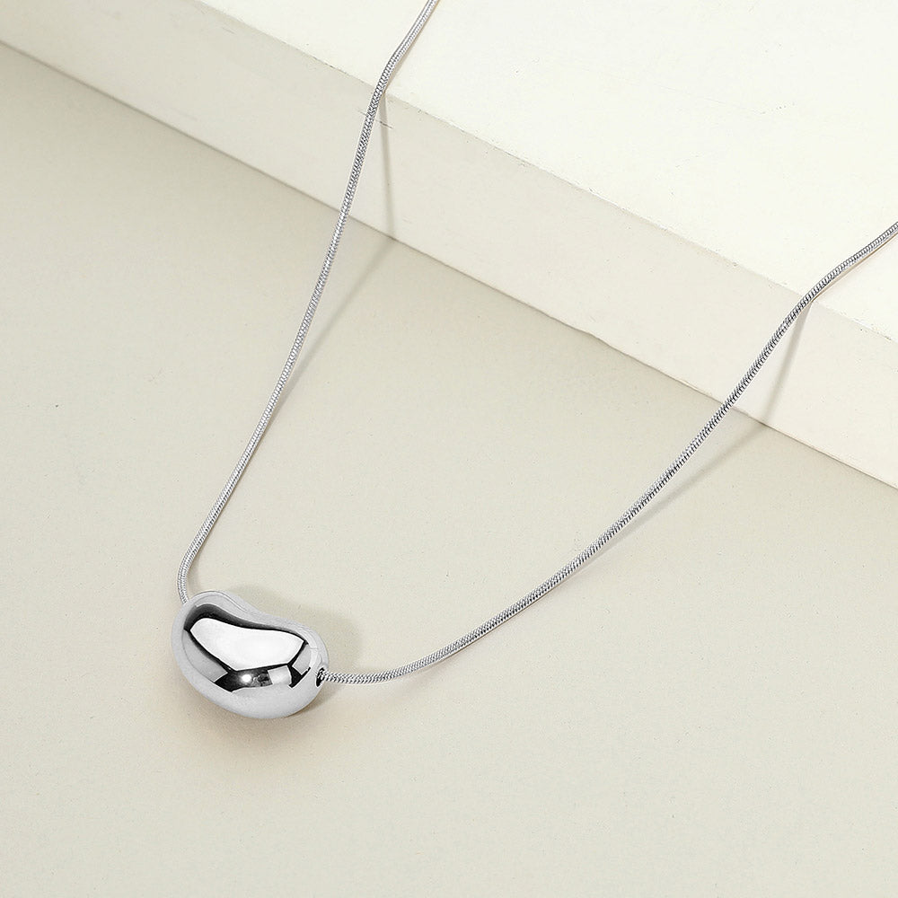 Madeline Love Rhodium Stainless Steel Bean Pendant Necklace - Jewelry