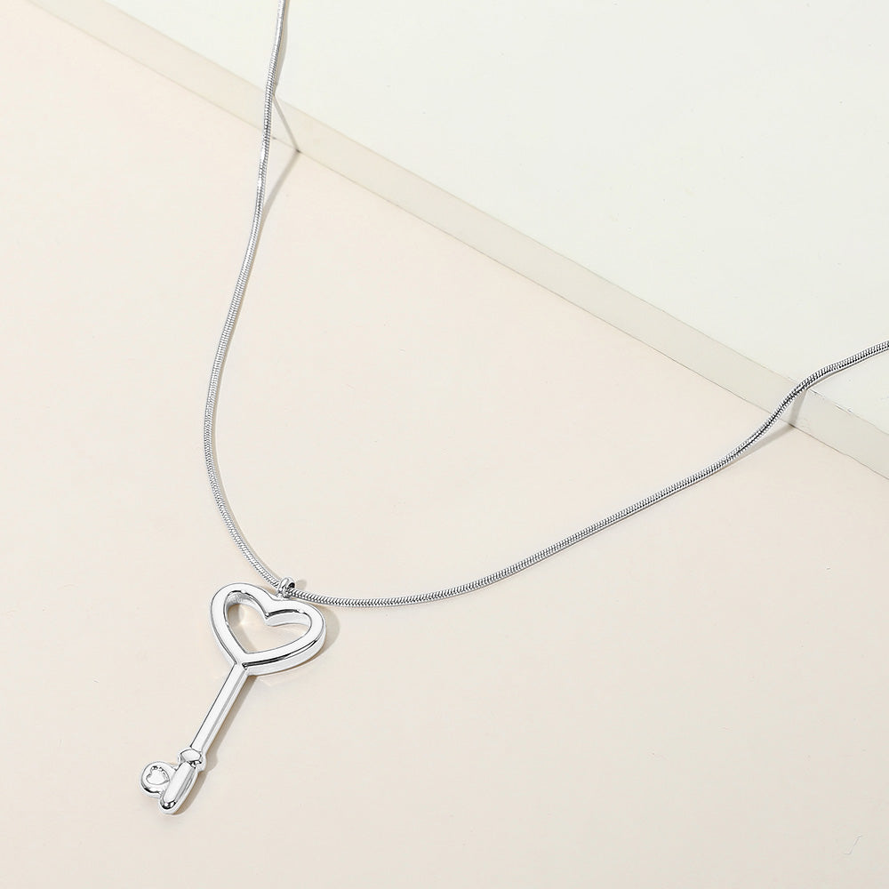 Madeline Love Rhodium Stainless Steel Heart Key Pendant Snake Chain Necklace - Hair Accessories