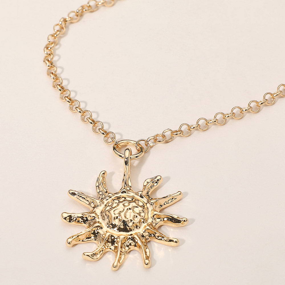 Madeline Love Gold Textured Metal Radiant Sun Pendant Necklace - Necklaces