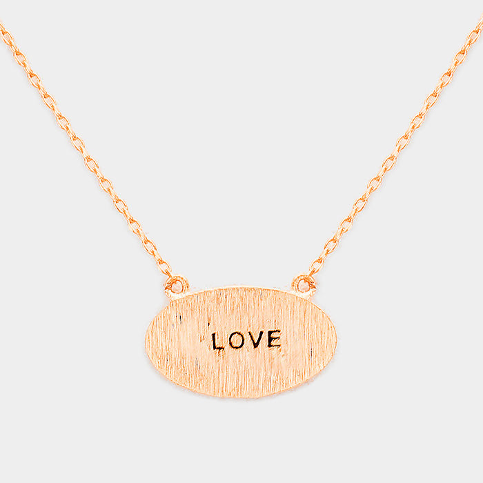 Madeline Love Rose Gold "Love" Brass Oval Metal Pendant Necklace - Necklaces