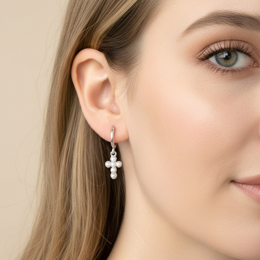 Madeline Love Silver, White Gold White Gold Dipped Center Pearl Cross Charm Drop Mini Huggie Hoop Earrings