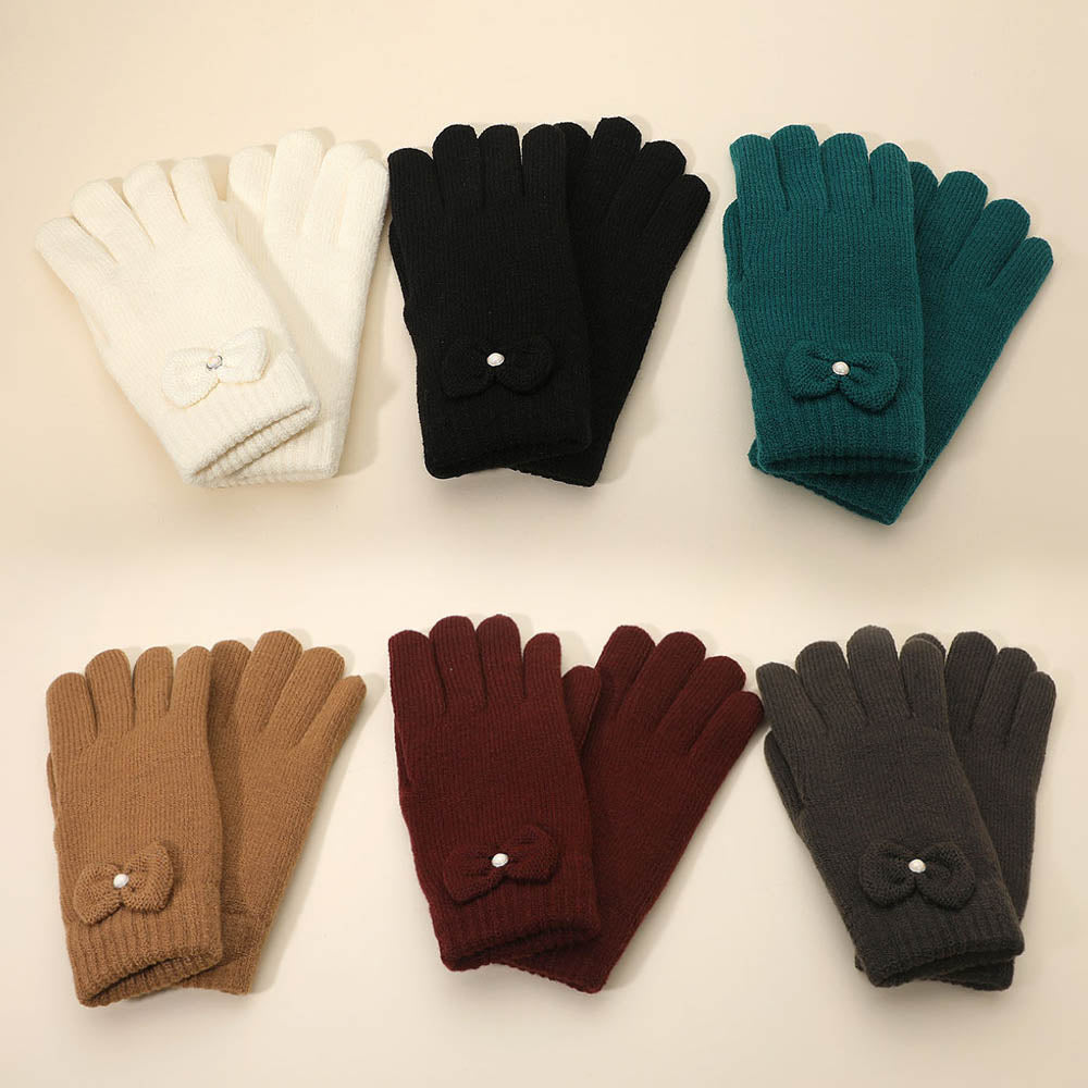 Assorted Soft knit gloves featuring a charming bow detail and cozy full-finger coverage. Designed for warmth and style, these gloves offer a snug fit and elegant touch, perfect for cold-weather outfits and everyday wear during chilly seasons.