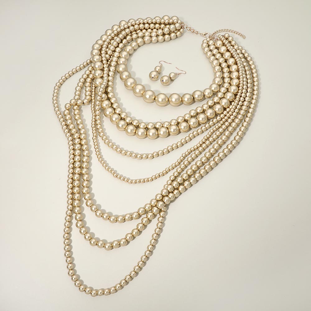 Madeline Love Gold Multi-layer pearl strand bib necklace