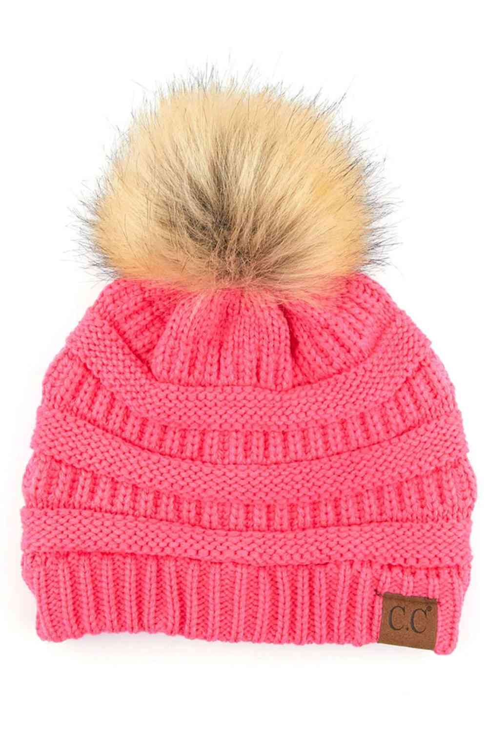 New_Lavender Pom Pom Knit Beanie, crafted from 100% soft acrylic for all-day comfort. The ribbed knit design adds texture and durability, while the signature pom pom on top brings a playful touch to any winter outfit. One size fits most, making it the perfect accessory for everyone. Ideal for cold weather adventures or casual everyday wear.