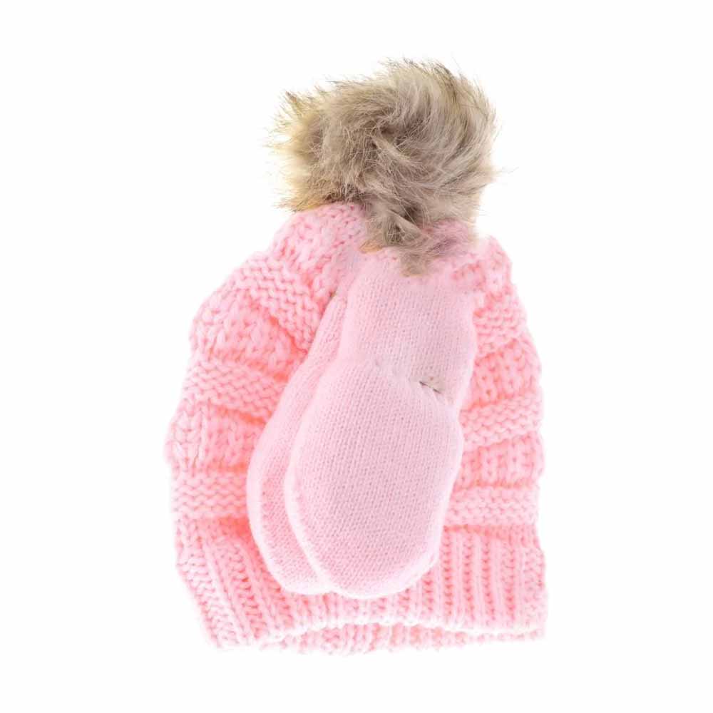PalePink BABY Solid Knit Faux Fur Pom C.C Beanie with Mitten Set combines warmth and style for your infant. Featuring a soft knit construction and a plush faux fur pom, the beanie offers gentle insulation while the coordinating mittens keep tiny hands protected from chilly weather. This set is designed with comfort and durability in mind, providing reliable cold-weather coverage that is both functional and fashionable for everyday use.
