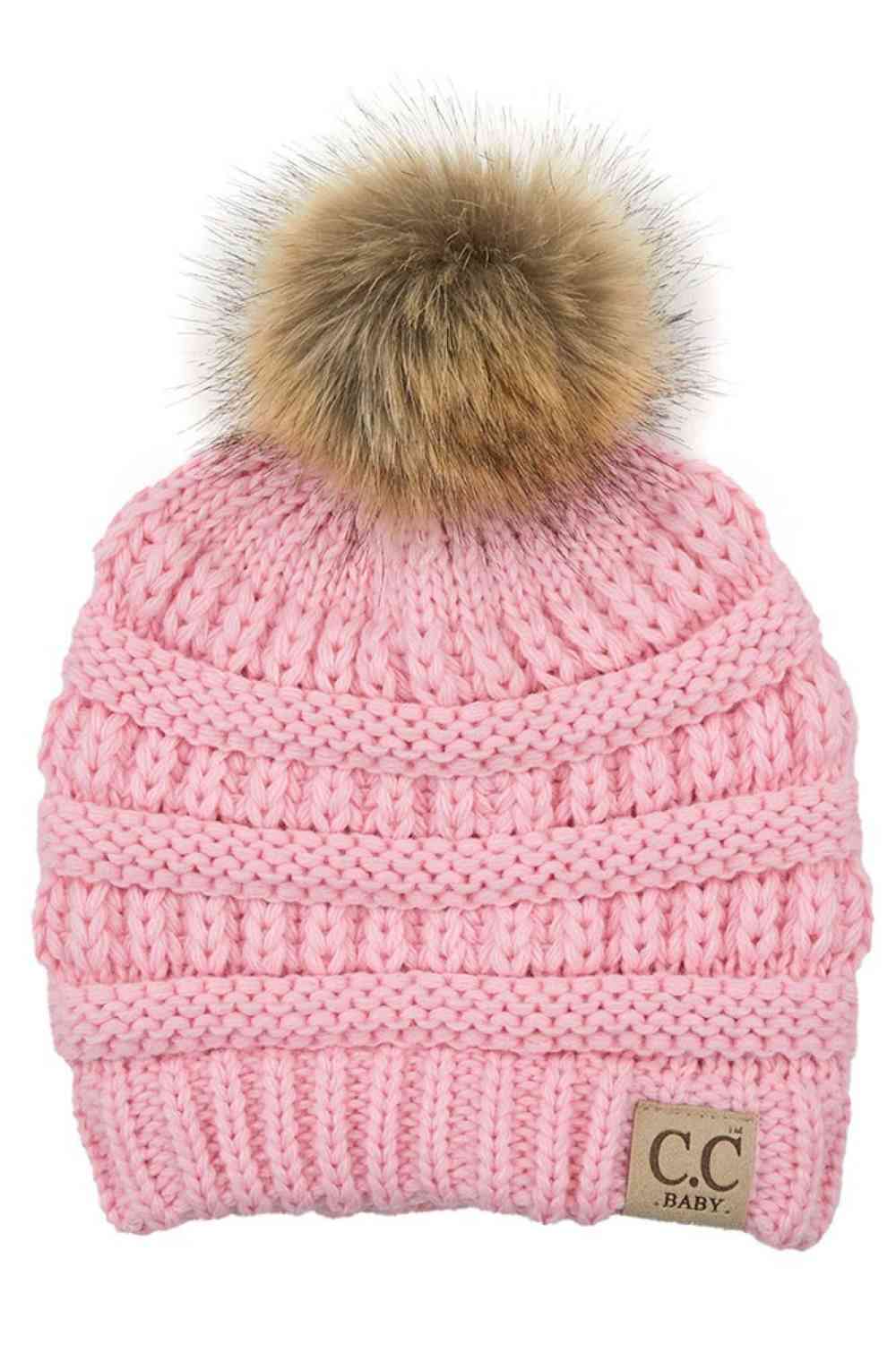 Pale Pink Keep your little one warm and cozy with this C.C Solid Ribbed Infant Beanie. Made from 100% acrylic, the soft ribbed knit construction provides gentle comfort against delicate skin while the natural fur pom adds a charming detail.