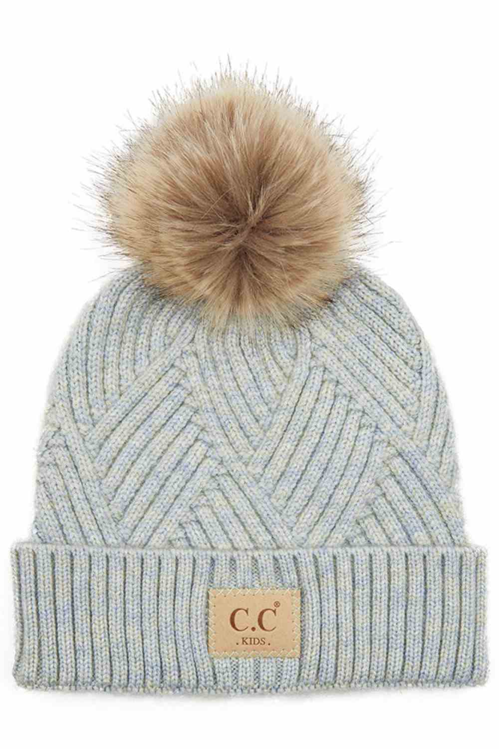 PAstle Blue Keep your little one cozy with this C.C Kids Knit Beanie, featuring a playful diagonal stripes criss-cross pattern. Crafted from a soft blend of 47% rayon, 31% PBT, and 22% nylon, this beanie offers warmth and durability for everyday wear.