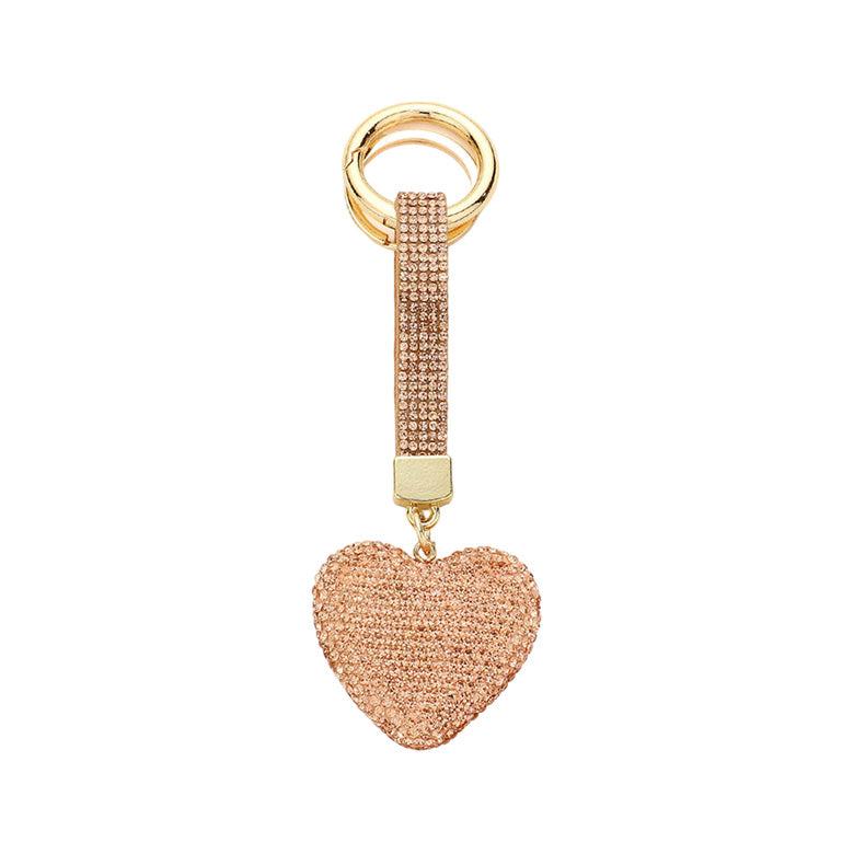 Peach Bling Heart Keychain, is beautifully designed with a heart-themed stone design that will make a glowing touch on one's heart whom you care about & love. Crafted with durable materials, this accessory shines and sparkles. It's an excellent gift for your loved ones to make their moment special.