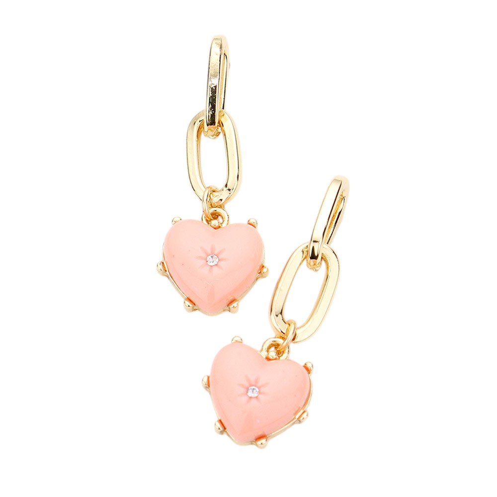 Peach Rhinestone Centred Resin Heart Dangle Earrings - the perfect combination of elegance and charm. These earrings feature a dazzling rhinestone centred on a heart-shaped resin pendant, adding a touch of sparkle to any outfit. Expertly crafted with high-quality materials, our earrings are sure to make a statement.