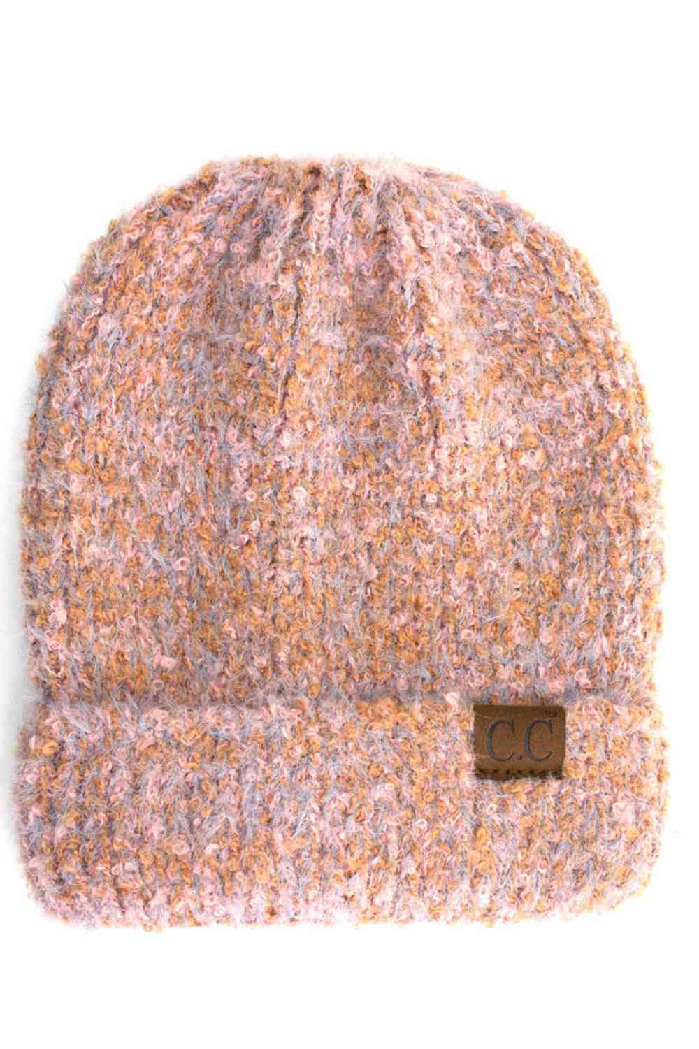 Peach Stay warm and stylish with the C.C Classic Tone Soft Beanie, crafted from 100% acrylic for lasting comfort and durability. This versatile beanie features a soft, cozy construction with a classic cuff design that works perfectly for any season.