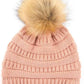 Peach Stay warm and cozy with this classic C.C Pom Pom Knit Beanie, crafted from 100% soft acrylic for all-day comfort. The ribbed knit design adds texture and durability, while the signature pom pom on top brings a playful touch to any winter outfit. One size fits most, making it the perfect accessory for everyone. Ideal for cold weather adventures or casual everyday wear.