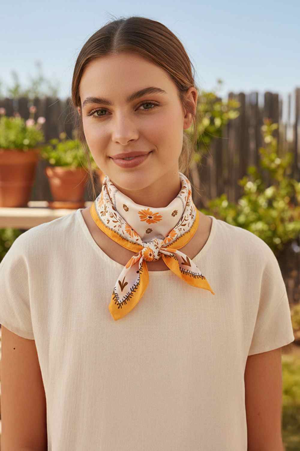 Peach Elevate your accessory game with this versatile floral bandana scarf. Crafted from lightweight, silky 100% polyester, it drapes beautifully and feels luxurious against your skin. The generous 27.5" x 27.5" square size offers endless styling possibilities wear it as a headscarf, neck wrap, or tie it to your bag for a pop of color. Perfect for all seasons, this printed design transitions seamlessly from casual to chic. Whether you're protecting yourself from the sun or adding a fashion-forward touch to 