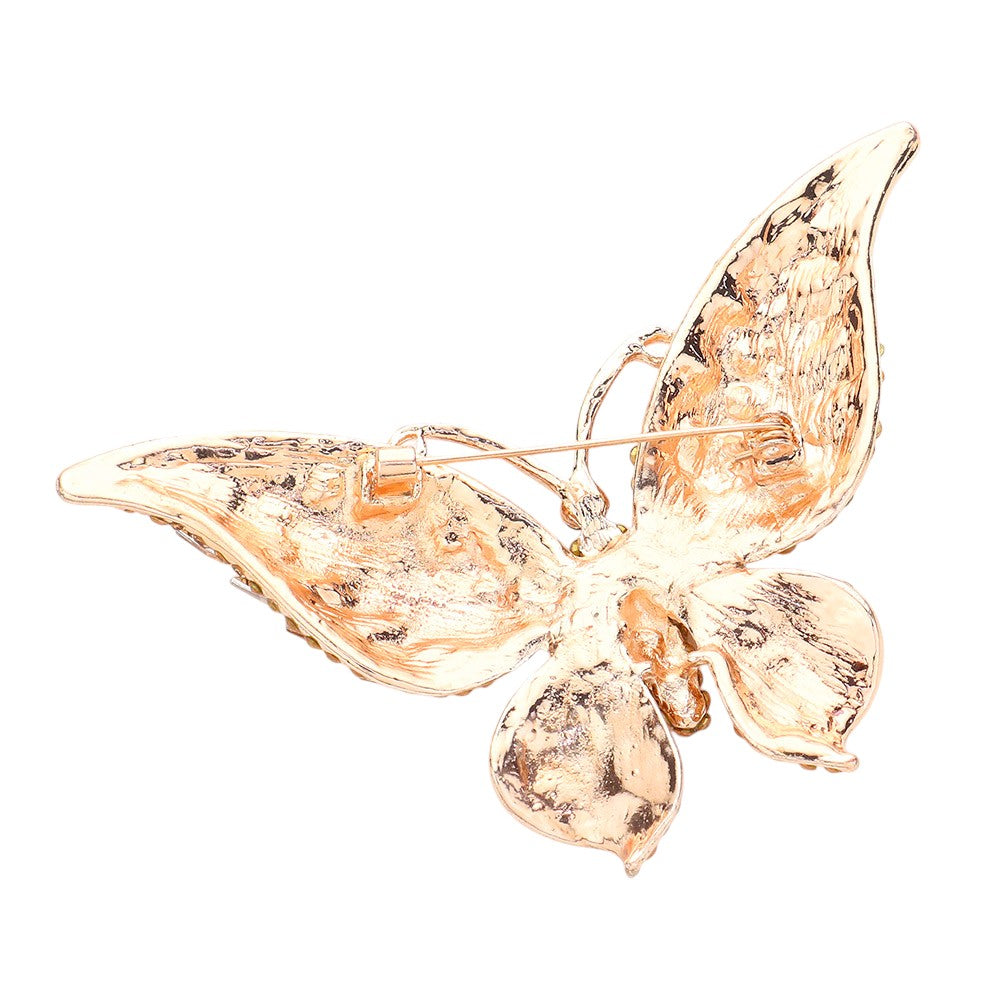 Peach Glass Crystal Butterfly Pin Brooch is expertly crafted with sparkling glass crystals, adding a touch of elegance and sophistication to any outfit. With its timeless butterfly design, this tasteful accessory is perfect for any occasion. Enhance your ensemble with a touch of shimmer and charm.