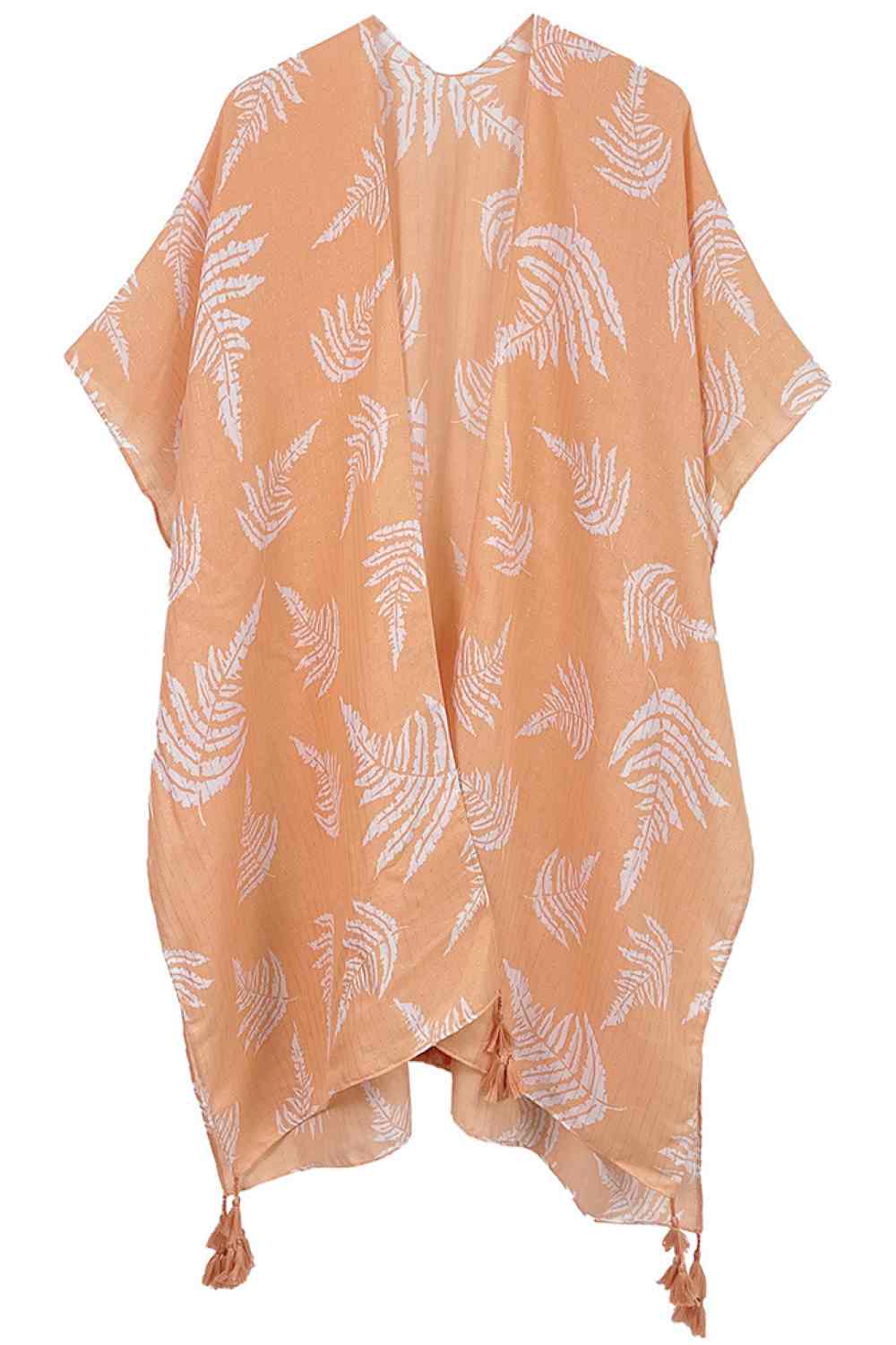 Peach Effortless elegance meets bohemian charm with this stunning leaf print kimono. Crafted from lightweight polyester, it features a sophisticated two-tone design accented with shimmering lurex threading and playful tassels at the hem. The generous 35.4" x 35.4" dimensions provide a relaxed, flowing fit perfect for layering over any outfit. Whether you're heading to the beach, a casual brunch, or an evening out, this versatile piece transitions seamlessly from day to night. A wardrobe essential that bring