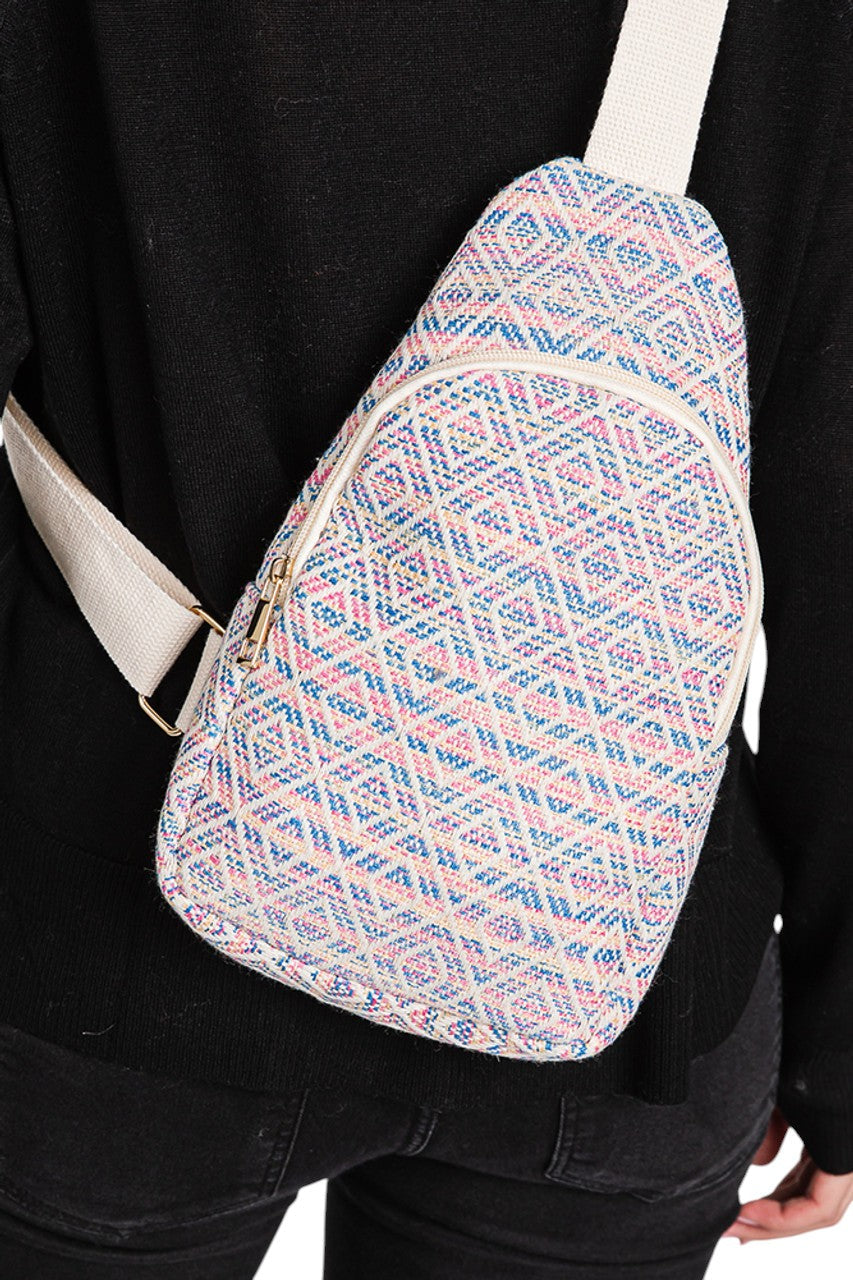Pink Aztec Pattern Sling Bag combines traditional design with modern functionality. Crafted with durable materials, it offers a spacious main compartment and adjustable strap for comfortable wear. Its distinctive Aztec pattern adds a unique, cultural touch, making it an ideal accessory for daily use or travel. This sling bag balances style and practicality, perfect for those seeking both aesthetic appeal and convenience.