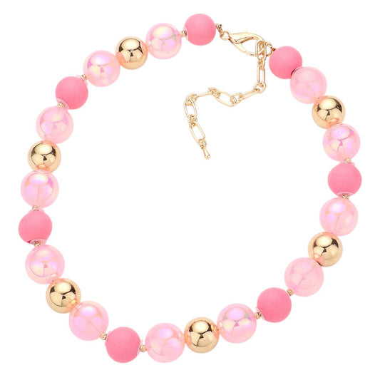 Pink Chunky Glass Metal Ball Beaded Necklace is a stunning addition to any outfit. The chunky glass and metal balls provide a bold and eye-catching look, while the beaded design adds a touch of elegance. Made with high-quality materials, this necklace is both durable and stylish. Elevate your style with this statement piece.