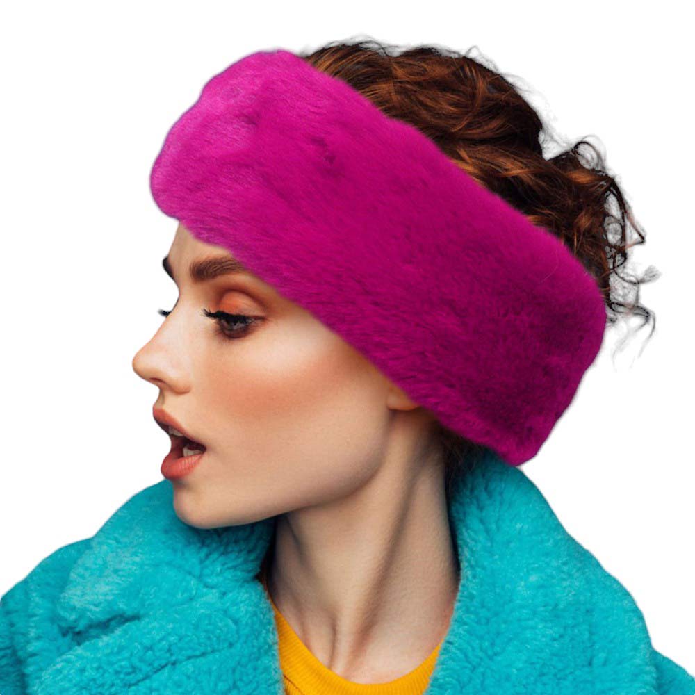 Pink Faux Fur Earmuff Headband, keeps your ears comfortably warm. The solid construction features luxurious faux fur for an elegant, yet practical look. Stay cozy and stylish during the coldest days of the year. Perfect winter gift for people you care about. 