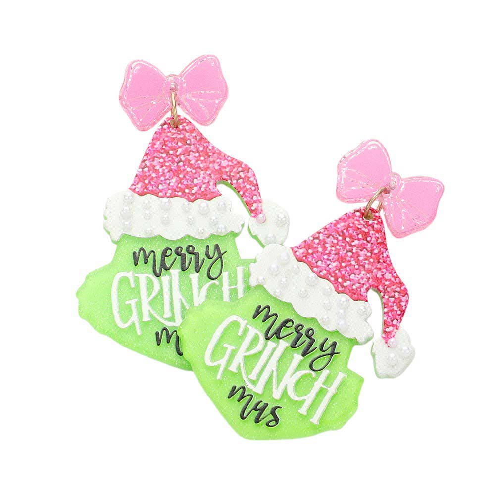 Pink-Glittered Resin Merry Grinch Mas Message Dangle Earrings are the perfect accessory for the holiday season. Made with glittered resin, the Merry Grinch Mas message dangle earrings add a touch of sparkle and whimsy to any outfit. Spread holiday cheer with this fun and festive jewelry piece.